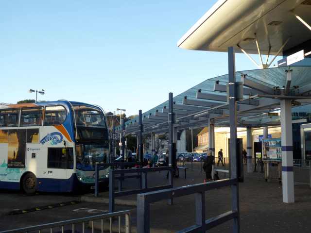 Hastings Station Interchange. Letters indicate bus stands. Timetables are displayed on poles. The shrinking but still substantial student population at the FE college can't be impressed. We should get it right for the young and we haven't.